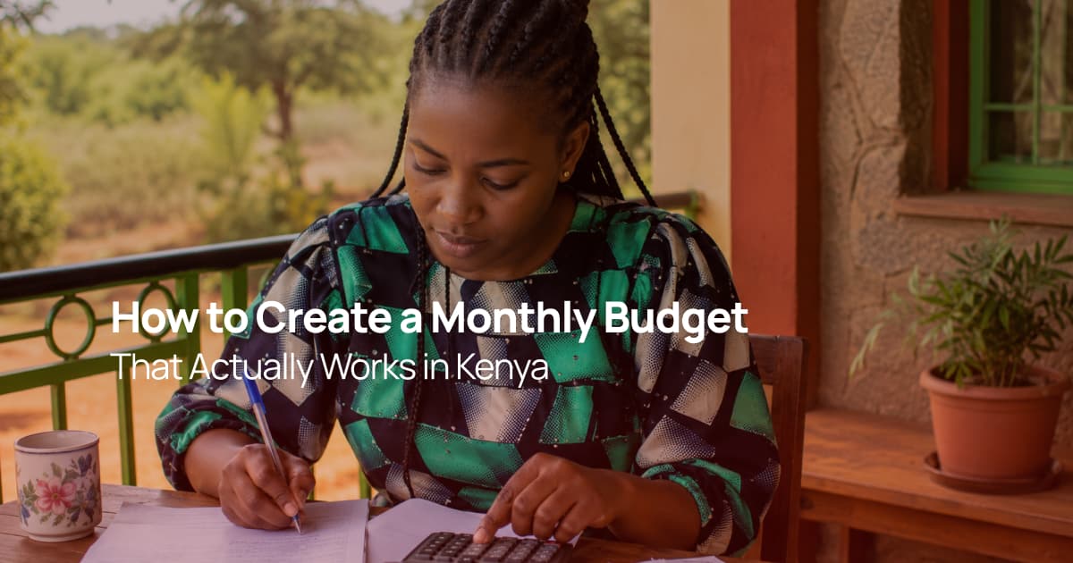 A Kenyan woman calculating her monthly budget with papers and a calculator while planning her household finances at home.